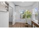 Charming breakfast nook with large windows, modern cabinets and views of the lush outdoors at 652 Verdos Dr, Elizabeth, CO 80107