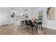 Bright dining area with modern decor, a breakfast bar, and natural light at 652 Verdos Dr, Elizabeth, CO 80107
