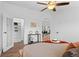 Bright main bedroom features a ceiling fan, walk-in closet and plenty of natural light at 652 Verdos Dr, Elizabeth, CO 80107