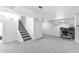 Finished basement with office and stairs at 1381 Mariposa Dr, Denver, CO 80221