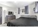 Spacious bedroom with dresser and large bed at 1381 Mariposa Dr, Denver, CO 80221