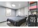 Basement bedroom with a full-size bed at 1381 Mariposa Dr, Denver, CO 80221