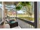 Inviting front porch with a swing and hanging plants, perfect for relaxing outdoors at 3422 W 125Th Dr, Broomfield, CO 80020
