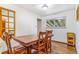 Classic dining room featuring hardwood floors, and a window for natural light at 111 S Eaton St, Lakewood, CO 80226