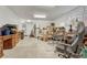 Unfinished basement area with refrigerator and work table at 20434 Kenneth Lainer Dr, Monument, CO 80132