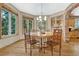 Elegant dining room with a round table and hardwood floors at 20434 Kenneth Lainer Dr, Monument, CO 80132