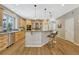 Spacious kitchen with island, wood cabinets, and stainless steel appliances at 20434 Kenneth Lainer Dr, Monument, CO 80132