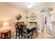 Stylish dining area featuring a dining table with seating for six and modern decor at 833 E 98 Ave # 204, Thornton, CO 80229