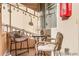 Cozy patio area with comfortable seating, a small table, and shade for relaxing outdoors at 833 E 98 Ave # 204, Thornton, CO 80229