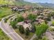 Bird's eye view of upscale residential community with unique homes and manicured landscaping at 10506 Brown Fox Trl, Littleton, CO 80125