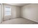 Bright bedroom with neutral walls and carpeted floor at 21239 E 62Nd Ave, Aurora, CO 80019