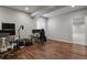 Finished basement area featuring a multi-monitor gaming and computer workstation at 12938 Bridge View Ln, Parker, CO 80134