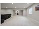 Large, open basement area with neutral carpet and recessed lighting at 12938 Bridge View Ln, Parker, CO 80134