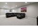 This basement features a large sectional sofa and recessed lighting at 12938 Bridge View Ln, Parker, CO 80134