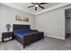 Beautiful main bedroom with carpeting, windows, and dark wood accents at 12938 Bridge View Ln, Parker, CO 80134