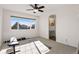 Bright bedroom featuring an ensuite bathroom, natural light and neutral paint at 12457 Topaz Vista Way, Castle Pines, CO 80108