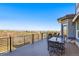 Outdoor deck space with dining and expansive views at 12457 Topaz Vista Way, Castle Pines, CO 80108