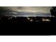 Night view of city lights and distant horizon from a dark vantage point at 12457 Topaz Vista Way, Castle Pines, CO 80108