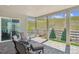 Covered patio with stone flooring and outdoor furniture offering a relaxing space to enjoy the outdoor view at 547 Scrubjay Cir, Castle Rock, CO 80104