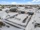 Aerial view of a community park with playground and open space in winter at 6350 Stable View St, Castle Pines, CO 80108