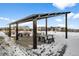 Covered picnic tables in a community snow-covered park at 6350 Stable View St, Castle Pines, CO 80108