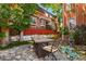 Backyard area with patio, outdoor furniture, and lush landscaping, perfect for outdoor enjoyment at 1160 York St, Denver, CO 80206