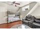 Finished bonus room with bunkbeds and a leather recliner at 1160 York St, Denver, CO 80206