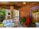 Charming front porch featuring comfortable seating and a warm, welcoming atmosphere with a lovely decor at 1160 York St, Denver, CO 80206