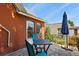 Outdoor patio area with table, chairs, and umbrella, perfect for relaxing and entertaining at 1160 York St, Denver, CO 80206