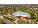 Aerial shot of a community pool and recreation area with ample seating and sunbathing space at 4958 Valentia Ct, Denver, CO 80238