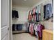 Spacious walk in closet with clothing racks and room to spare at 10588 Parkington Ln # 39A, Highlands Ranch, CO 80126