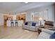 An open-concept floor plan with a view of the kitchen and comfortable seating at 10588 Parkington Ln # 39A, Highlands Ranch, CO 80126