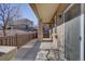 Covered back patio with iron railing and view of neighborhood at 10588 Parkington Ln # 39A, Highlands Ranch, CO 80126