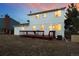 Spacious backyard featuring a wooden deck, ideal for outdoor entertaining and relaxation at 14552 E Tufts Ave, Aurora, CO 80015