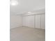 Spacious bedroom with three closets and carpeted floors at 14552 E Tufts Ave, Aurora, CO 80015