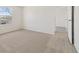 Bedroom with window with a view and doorway to another room at 14552 E Tufts Ave, Aurora, CO 80015