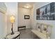 Foyer with art, lamp, and a long entryway that leads to other areas of the house at 1640 Aspen Meadows Cir, Federal Heights, CO 80260