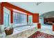 Large primary bath with soaking tub and large windows at 7355 Nile St, Arvada, CO 80007
