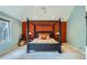 Comfortable bedroom with stylish decor and an elegant four-poster bed at 7355 Nile St, Arvada, CO 80007