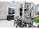 Backyard stone patio featuring outdoor furniture and a barbecue grill for outdoor entertaining at 3421 E 143Rd Dr, Thornton, CO 80602