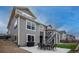 Backyard with outdoor furniture, patio, deck, and grass for a perfect outdoor setting at 3421 E 143Rd Dr, Thornton, CO 80602