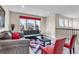 Bright living room featuring a comfortable seating area and natural light at 3421 E 143Rd Dr, Thornton, CO 80602