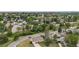 Expansive aerial view of a peaceful neighborhood with lush greenery and charming homes and a view of the neighborhood beyond at 107 S Windsor Dr, Denver, CO 80219