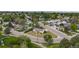 Elevated view capturing lush surroundings and a charming residential area with mature trees at 107 S Windsor Dr, Denver, CO 80219