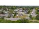 Scenic aerial shot of a cozy neighborhood with lush greenery and well-maintained homes at 107 S Windsor Dr, Denver, CO 80219