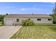 Charming single-story home with a well-maintained lawn and lovely curb appeal at 107 S Windsor Dr, Denver, CO 80219