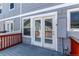 Private deck with access to the home through double glass doors at 19043 E 58Th Ave, Denver, CO 80249
