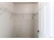Walk-in closet featuring white wire shelving and natural light at 19043 E 58Th Ave, Denver, CO 80249