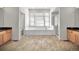 Bright bathroom featuring a large soaking tub, stand up shower, and dual vanities at 9232 Bauer Ct, Lone Tree, CO 80124