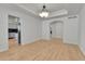 Dining room with hardwood floors and arched doorway at 9232 Bauer Ct, Lone Tree, CO 80124
